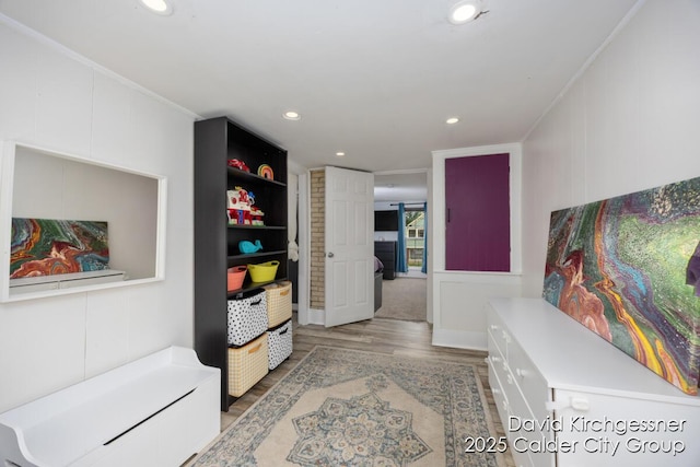 122 Dwight Ave SE, Grand Rapids, MI 49506 - hallway with light wood-type flooring, recessed lighting, and crown molding