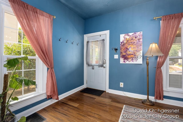122 Dwight Ave SE, Grand Rapids, MI 49506 - foyer featuring wood finished floors