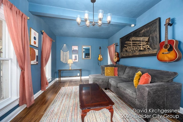 122 Dwight Ave SE, Grand Rapids, MI 49506 - living room with a chandelier, wood finished floors, and beam ceiling