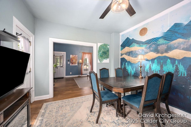 122 Dwight Ave SE, Grand Rapids, MI 49506 - dining space with ceiling fan and wood finished floors