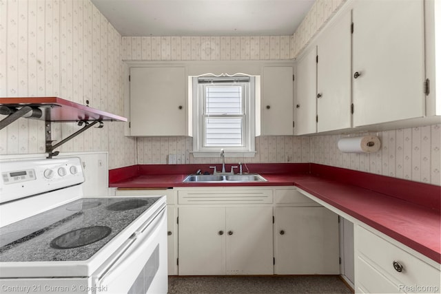 711 N Highland St, Dearborn, MI 48128 - kitchen featuring white range with electric cooktop, wallpapered walls, and dark countertops