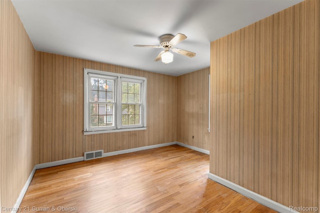 711 N Highland St, Dearborn, MI 48128 - unfurnished room with ceiling fan and light wood-style flooring