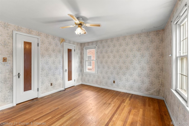 711 N Highland St, Dearborn, MI 48128 - spare room with light wood finished floors and a ceiling fan