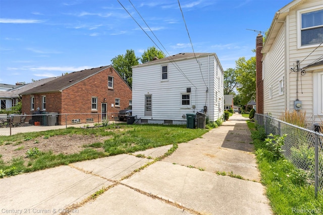 711 N Highland St, Dearborn, MI 48128 - back of property with concrete driveway
