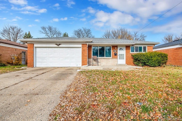 3217 Donna Ave, Warren, MI 48091 - single story home featuring an attached garage, driveway, and brick siding