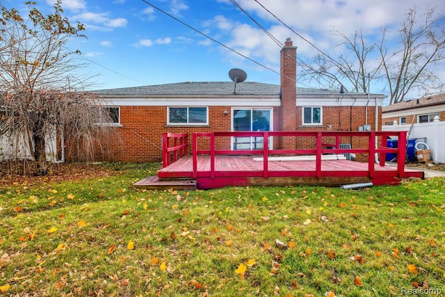 3217 Donna Ave, Warren, MI 48091 - back of house featuring brick siding, a chimney, and a wooden deck