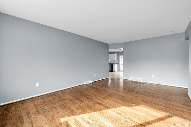 3217 Donna Ave, Warren, MI 48091 - spare room with wood finished floors and baseboards