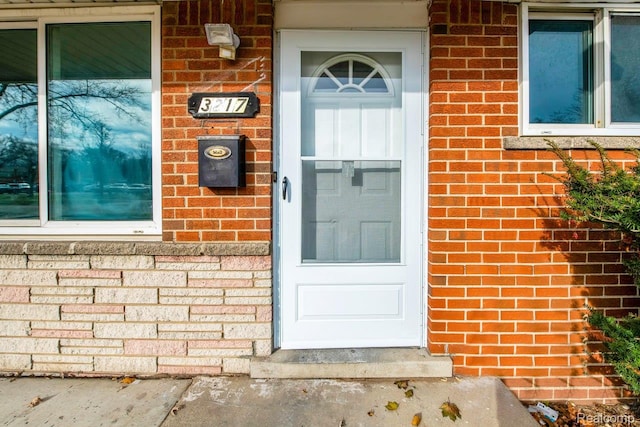 3217 Donna Ave, Warren, MI 48091 - doorway to property featuring brick siding