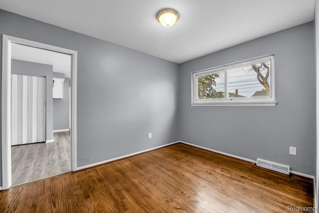 3217 Donna Ave, Warren, MI 48091 - unfurnished room featuring wood finished floors and baseboards