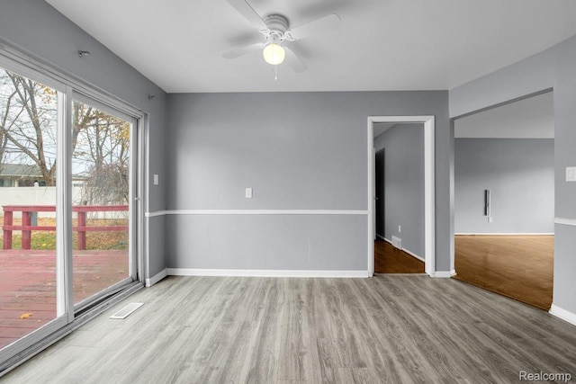 3217 Donna Ave, Warren, MI 48091 - empty room with wood finished floors and ceiling fan