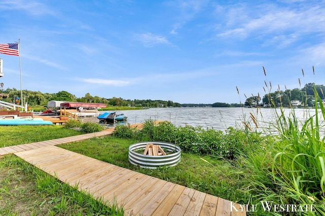 12230 Mac Dr NE, Belding, MI 48809 - view of yard with a water view and a boat dock