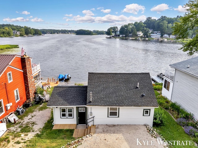 12230 Mac Dr NE, Belding, MI 48809 - aerial view of property and surrounding area featuring a nearby body of water