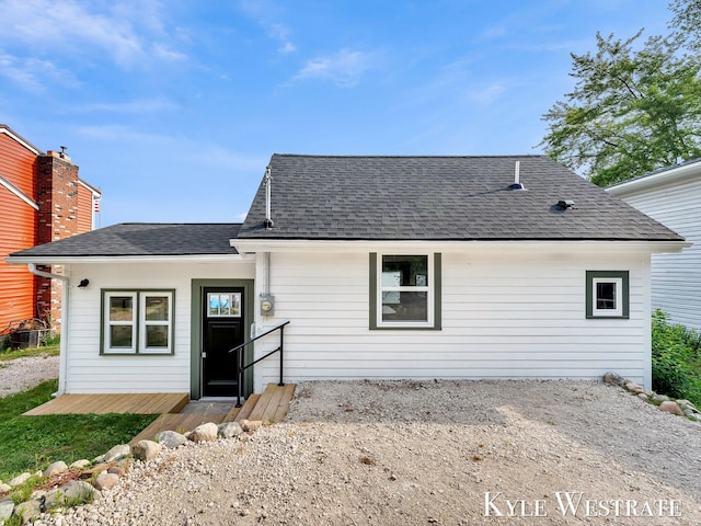 12230 Mac Dr NE, Belding, MI 48809 - view of front facade featuring roof with shingles