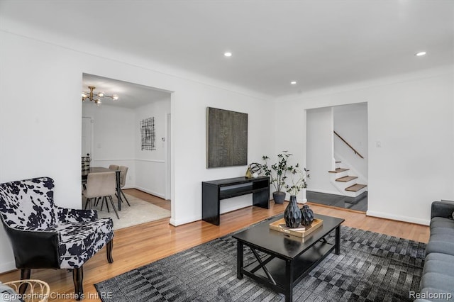17617 Kentucky St, Detroit, MI 48221 - living area with wood finished floors, stairs, recessed lighting, and a chandelier