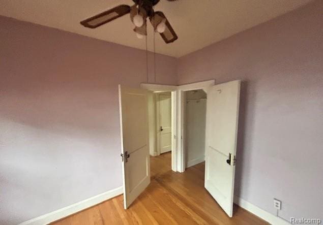 2170 Avondale St, Sylvan Lake, MI 48320 - empty room featuring ceiling fan and light wood-style floors