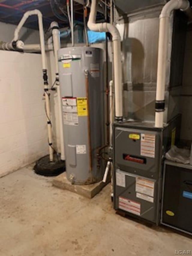 609 Orchard Ln, Tecumseh, MI 49286 - utilities with water heater and heating unit