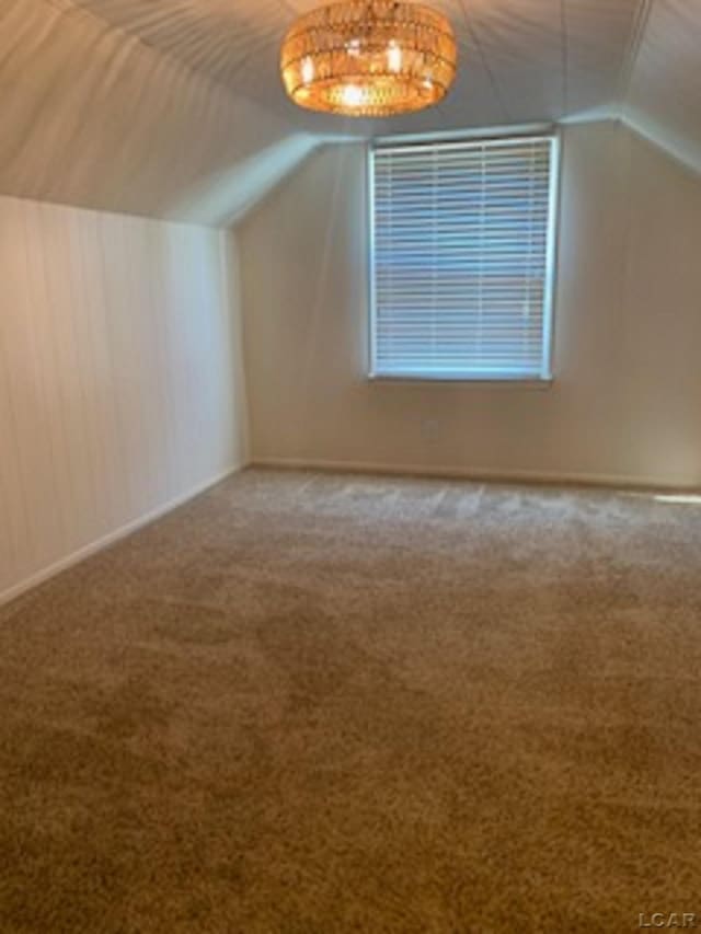 609 Orchard Ln, Tecumseh, MI 49286 - bonus room featuring lofted ceiling and carpet
