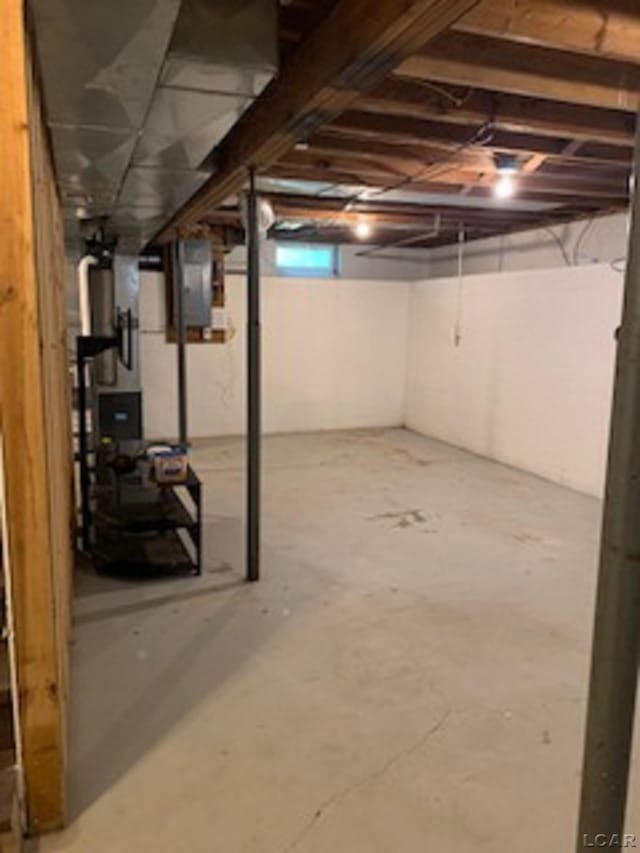 609 Orchard Ln, Tecumseh, MI 49286 - unfinished below grade area featuring electric panel
