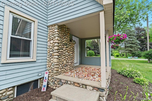 342 King St, Highland, MI 48357 - porch featuring a yard
