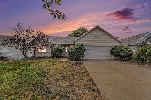 2953 Sunrise Ave, Holland, MI 49424 - view of front of property featuring an attached garage, driveway, and a shingled roof