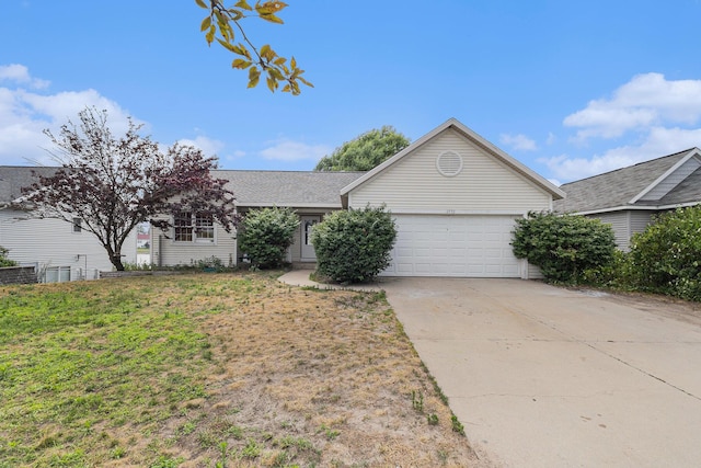2953 Sunrise Ave, Holland, MI 49424 - single story home with a garage, concrete driveway, and roof with shingles