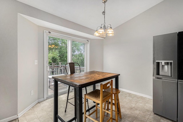 2953 Sunrise Ave, Holland, MI 49424 - dining area featuring a chandelier and lofted ceiling