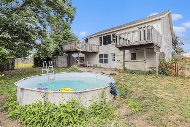 2953 Sunrise Ave, Holland, MI 49424 - rear view of house with a wooden deck