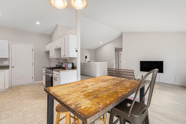 2953 Sunrise Ave, Holland, MI 49424 - dining space featuring vaulted ceiling and light flooring