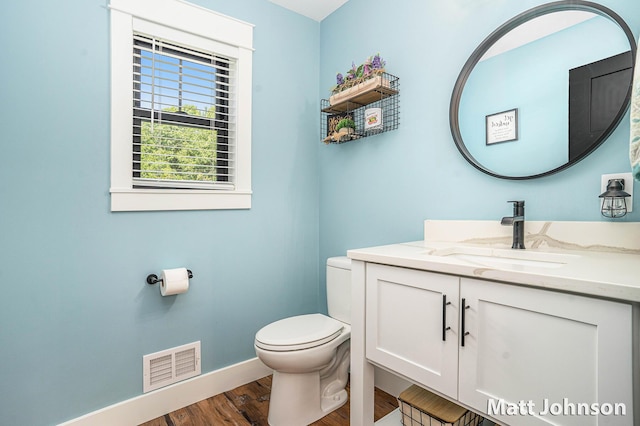 2771 Deer Run Rd, Muskegon, MI 49445 - half bathroom with vanity and wood finished floors
