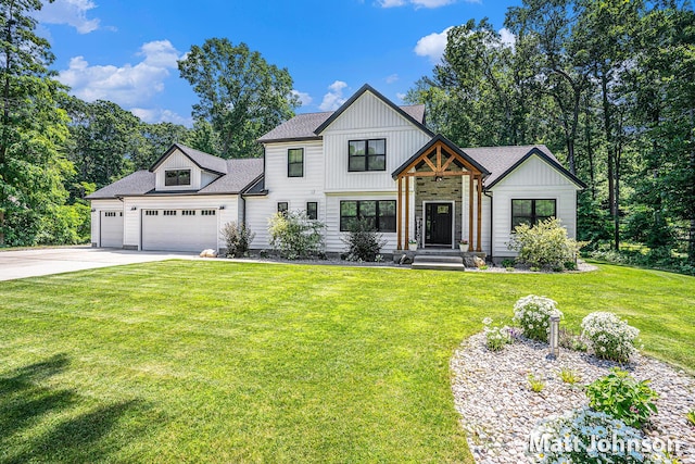 2771 Deer Run Rd, Muskegon, MI 49445 - modern farmhouse style home with driveway, an attached garage, a front yard, board and batten siding, and a shingled roof