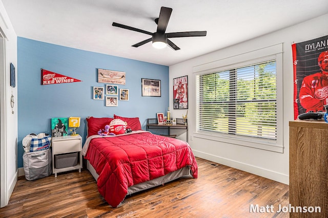 2771 Deer Run Rd, Muskegon, MI 49445 - bedroom with wood finished floors and a ceiling fan