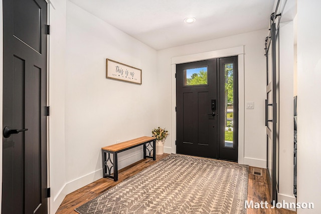 2771 Deer Run Rd, Muskegon, MI 49445 - entrance foyer featuring wood finished floors and recessed lighting