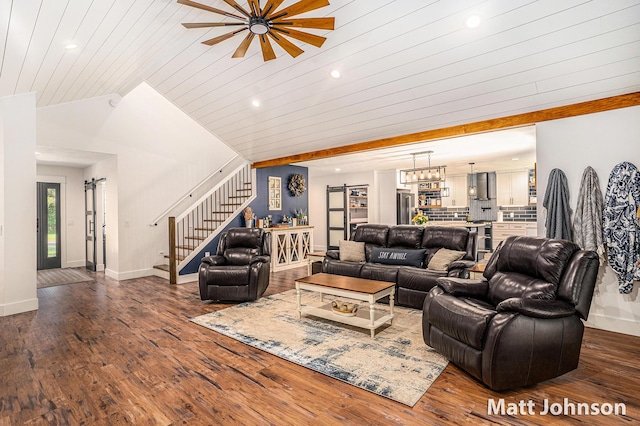 2771 Deer Run Rd, Muskegon, MI 49445 - living area with stairs, lofted ceiling, wood finished floors, and recessed lighting