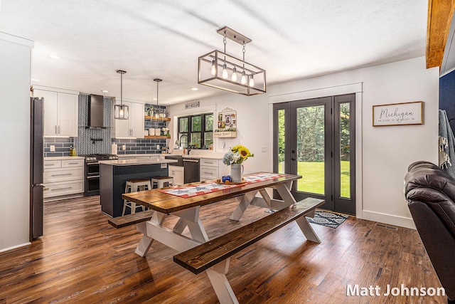 2771 Deer Run Rd, Muskegon, MI 49445 - dining area featuring dark wood-style floors and recessed lighting
