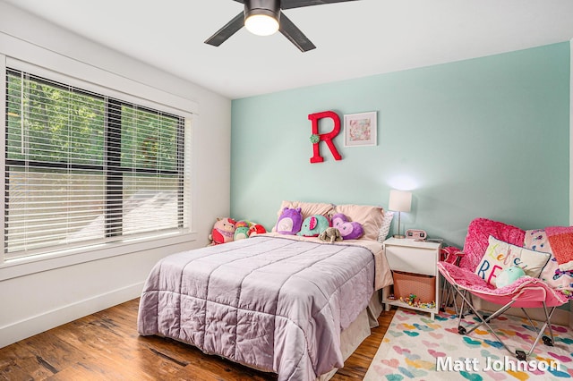 2771 Deer Run Rd, Muskegon, MI 49445 - bedroom with wood finished floors and a ceiling fan