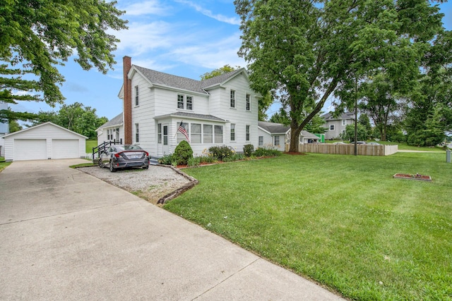 9148 Austin Rd, Saline, MI 48176 - view of front of house featuring an outbuilding, a chimney, a garage, and roof with shingles