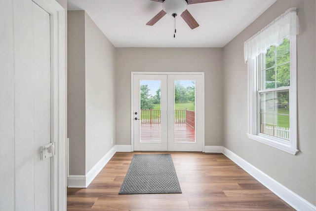 9148 Austin Rd, Saline, MI 48176 - doorway to outside with wood finished floors and ceiling fan