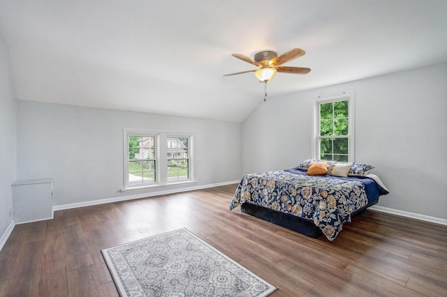 9148 Austin Rd, Saline, MI 48176 - bedroom featuring vaulted ceiling, wood finished floors, and a ceiling fan