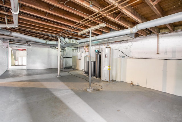9148 Austin Rd, Saline, MI 48176 - basement featuring electric water heater, a water softener, and heating unit