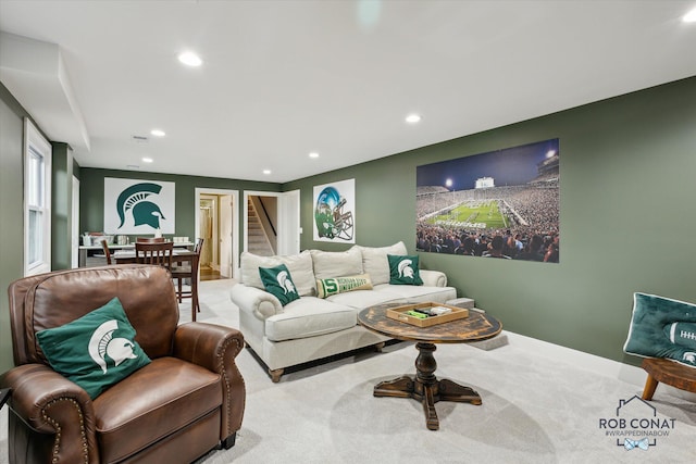 2641 Garfield Ave NW, Grand Rapids, MI 49544 - living room featuring recessed lighting, carpet, and stairway