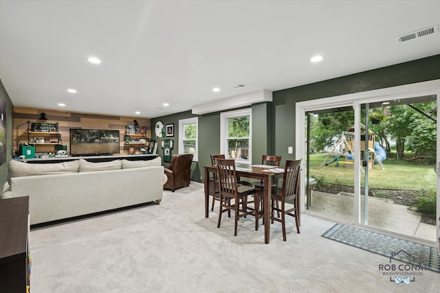 2641 Garfield Ave NW, Grand Rapids, MI 49544 - dining area featuring recessed lighting, healthy amount of natural light, and light colored carpet