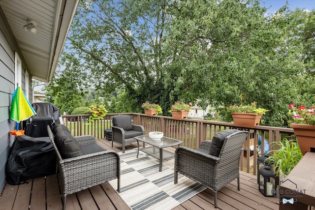 2641 Garfield Ave NW, Grand Rapids, MI 49544 - wooden deck with outdoor lounge area and grilling area