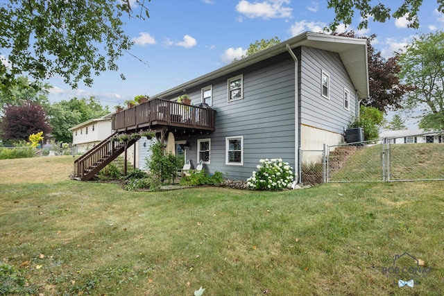 2641 Garfield Ave NW, Grand Rapids, MI 49544 - back of house featuring a gate, a wooden deck, and stairs