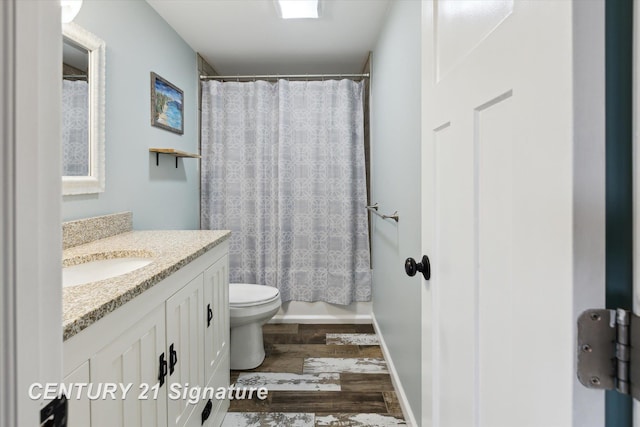 6357 Mackinaw Rd, Saginaw, MI 48604 - full bath with vanity, wood finished floors, and shower / bathtub combination with curtain