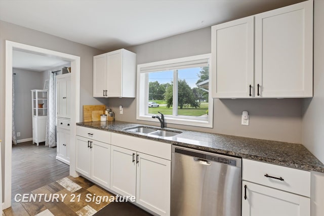 6357 Mackinaw Rd, Saginaw, MI 48604 - kitchen with dishwasher, white cabinets, dark stone countertops, and light wood-style floors