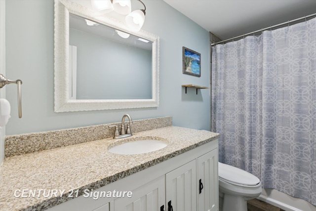6357 Mackinaw Rd, Saginaw, MI 48604 - bathroom with vanity and toilet