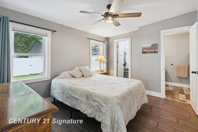 6357 Mackinaw Rd, Saginaw, MI 48604 - bedroom featuring dark wood-type flooring, a walk in closet, ceiling fan, and a closet