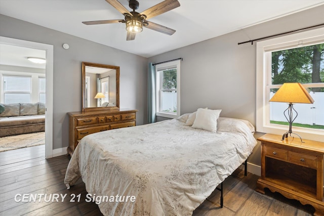 6357 Mackinaw Rd, Saginaw, MI 48604 - bedroom featuring dark wood-type flooring and a ceiling fan