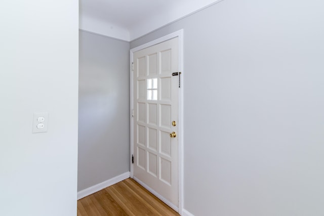 11015 Fairfield St, Livonia, MI 48150 - doorway to outside with light wood finished floors and baseboards