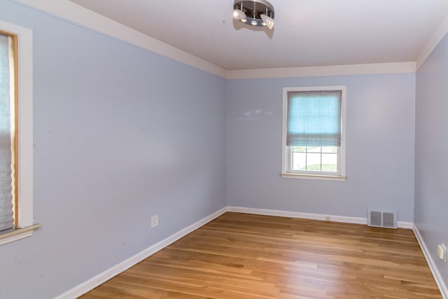 11015 Fairfield St, Livonia, MI 48150 - spare room featuring light wood finished floors and baseboards